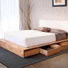 Double wooden bed with drawers