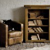 Raw wood bookcase for books and other needs can significantly save space in the room.