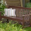 A comfortable narrow garden bench seats provide a place to contemplate nature, to relax after busy working day or week.