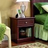 A small cherry nightstand can look like a bedside chair or other usual thing.