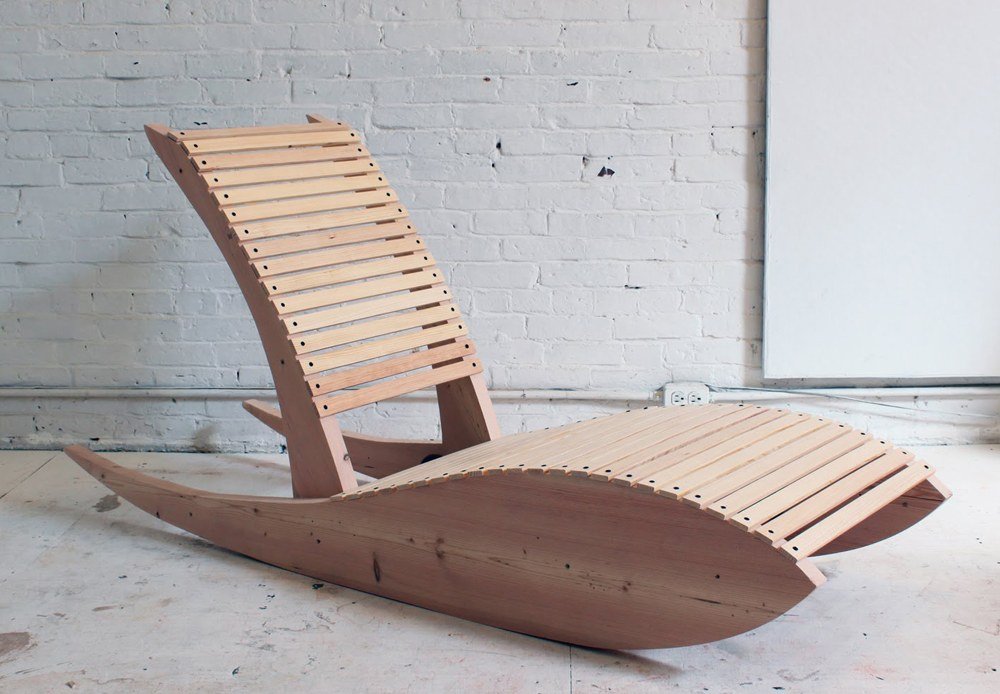 If you have a sunny balcony, you definitely need a big chaise lounge chair that is available on the market of wood furniture.
