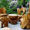 Combine two or more logs and you'll have a set of outdoor wood table ideas.