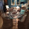 Round Dinind Table With Glass Top And Branch Base Rattan Chairs