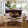 Sunroom Furnishing Ideas Using Bamboo Armchairs And Rounded Bamboo Tables