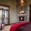 Fireplace From Stone Designed For Corner in the Bedroom