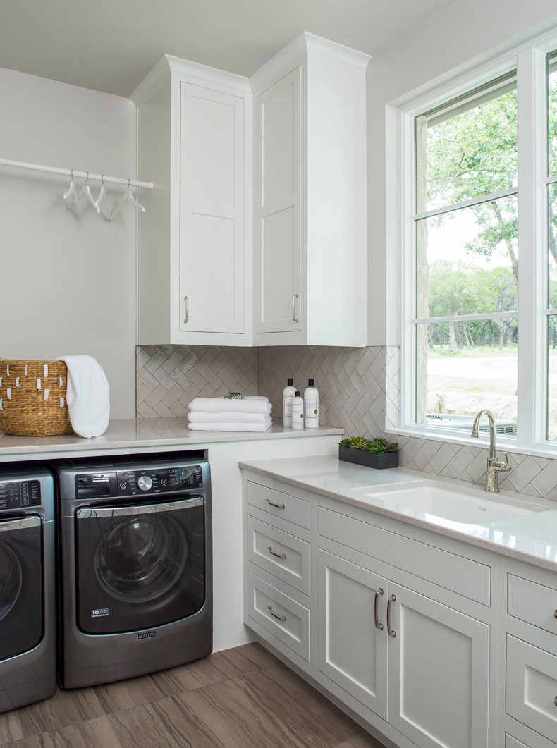 Laundry room corner cabinets become more popular nowadays.