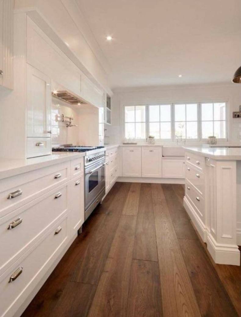 Clean White Kitchen Design With Wood Floor